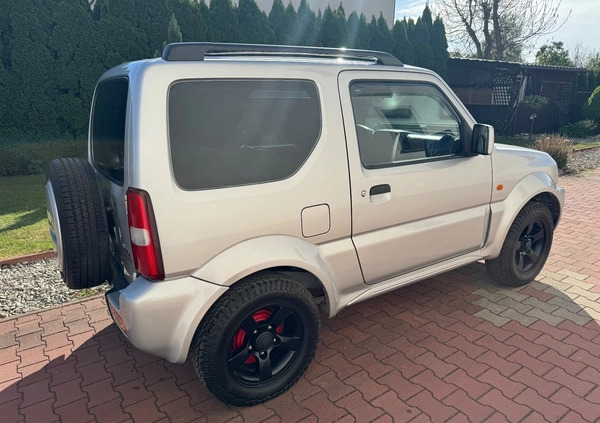 Suzuki Jimny cena 33900 przebieg: 166000, rok produkcji 2011 z Radomsko małe 497